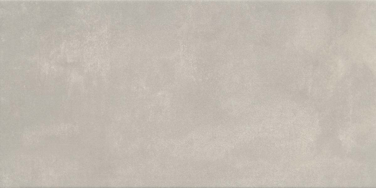 Ecru - Cosmopolitan by New York Cement Tile: a smooth, light gray surface with modern, brushed concrete-like texture.