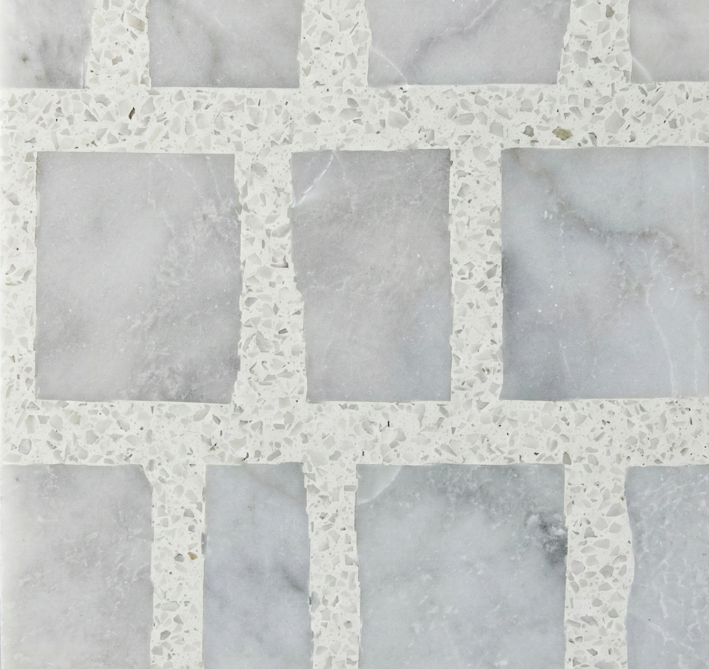 Marble tile with a grid pattern on a gray background
