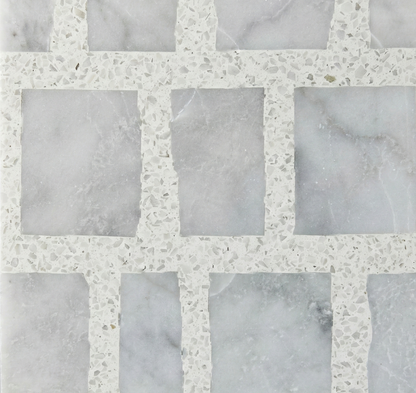 Marble tile with a grid pattern on a gray background