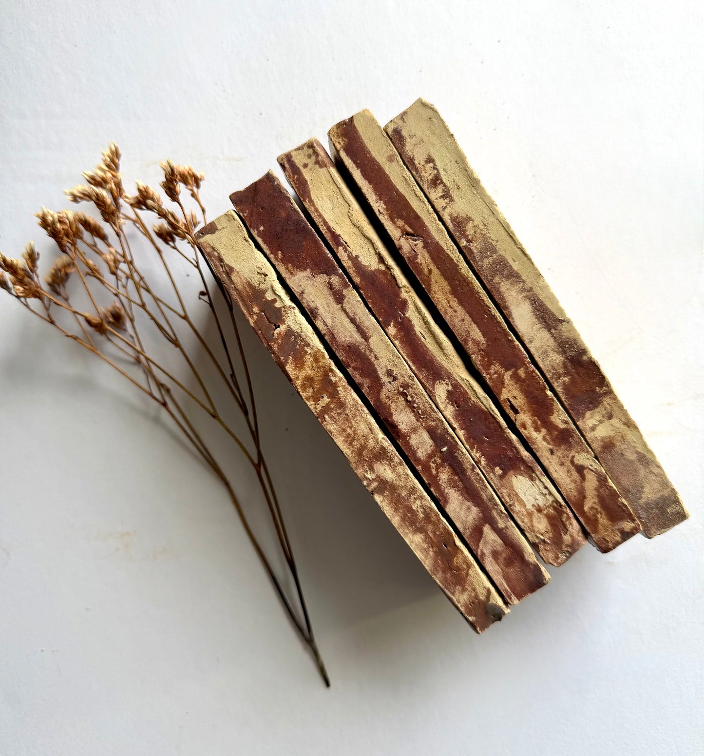 Five Thistle (2x6) handmade soaps by New York Cement Tile, stacked with dried flowers in a vintage Zellige tile style.