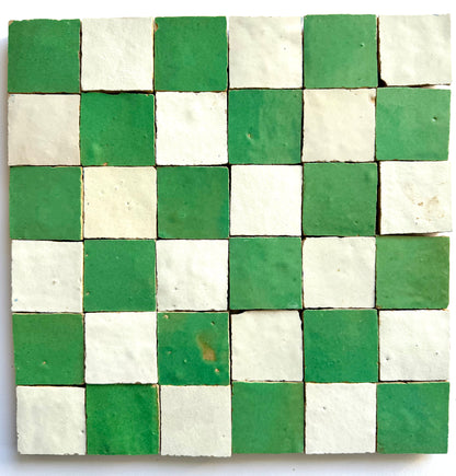 The 2X2 Checkerboard Zellige in Ivory Cloud and Green by New York Cement Tile features small square ceramic tiles.