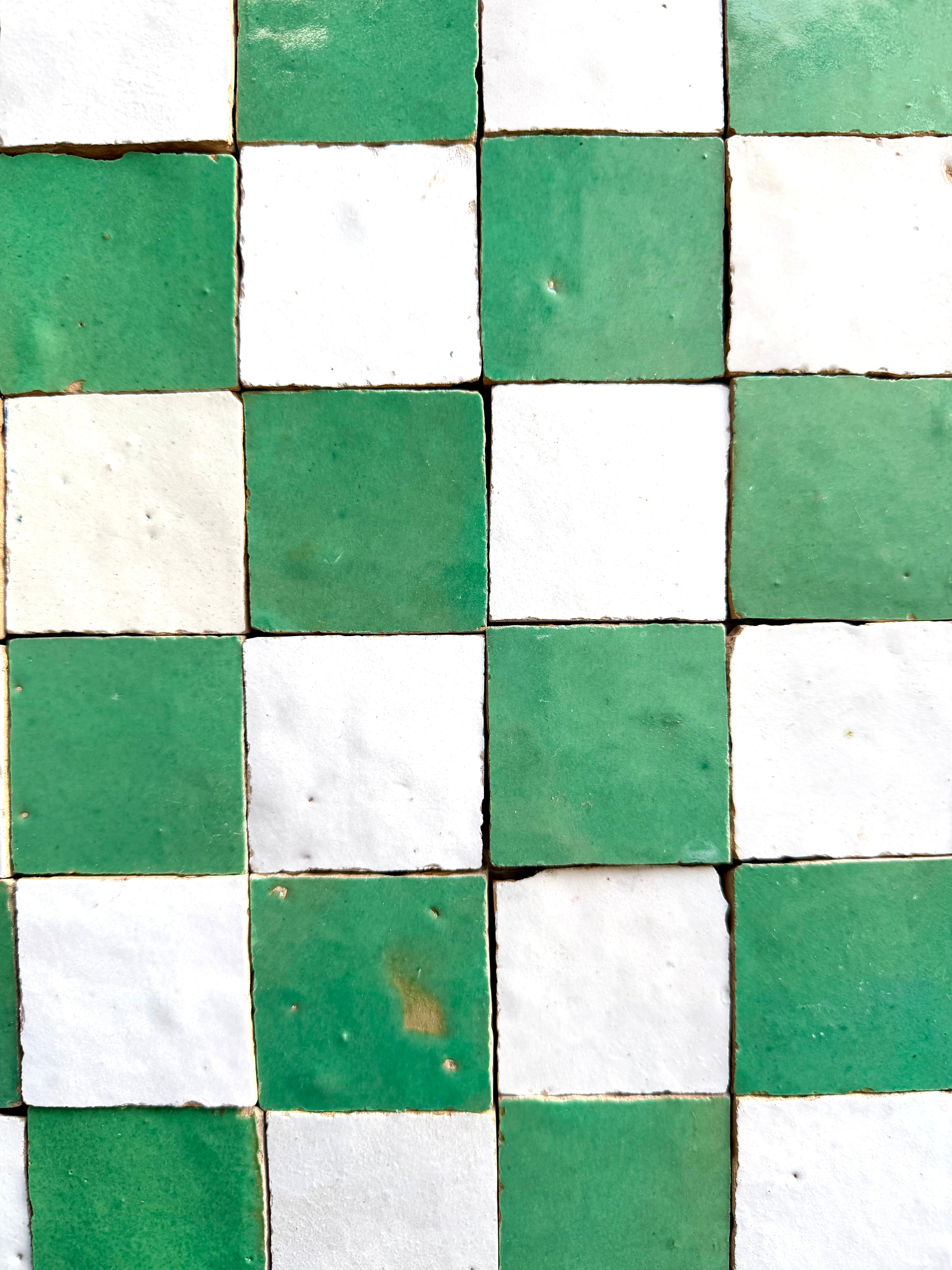 2X2 Checkerboard Zellige in Ivory Cloud and Green by New York Cement Tile features green and ivory square tiles in a checkerboard.