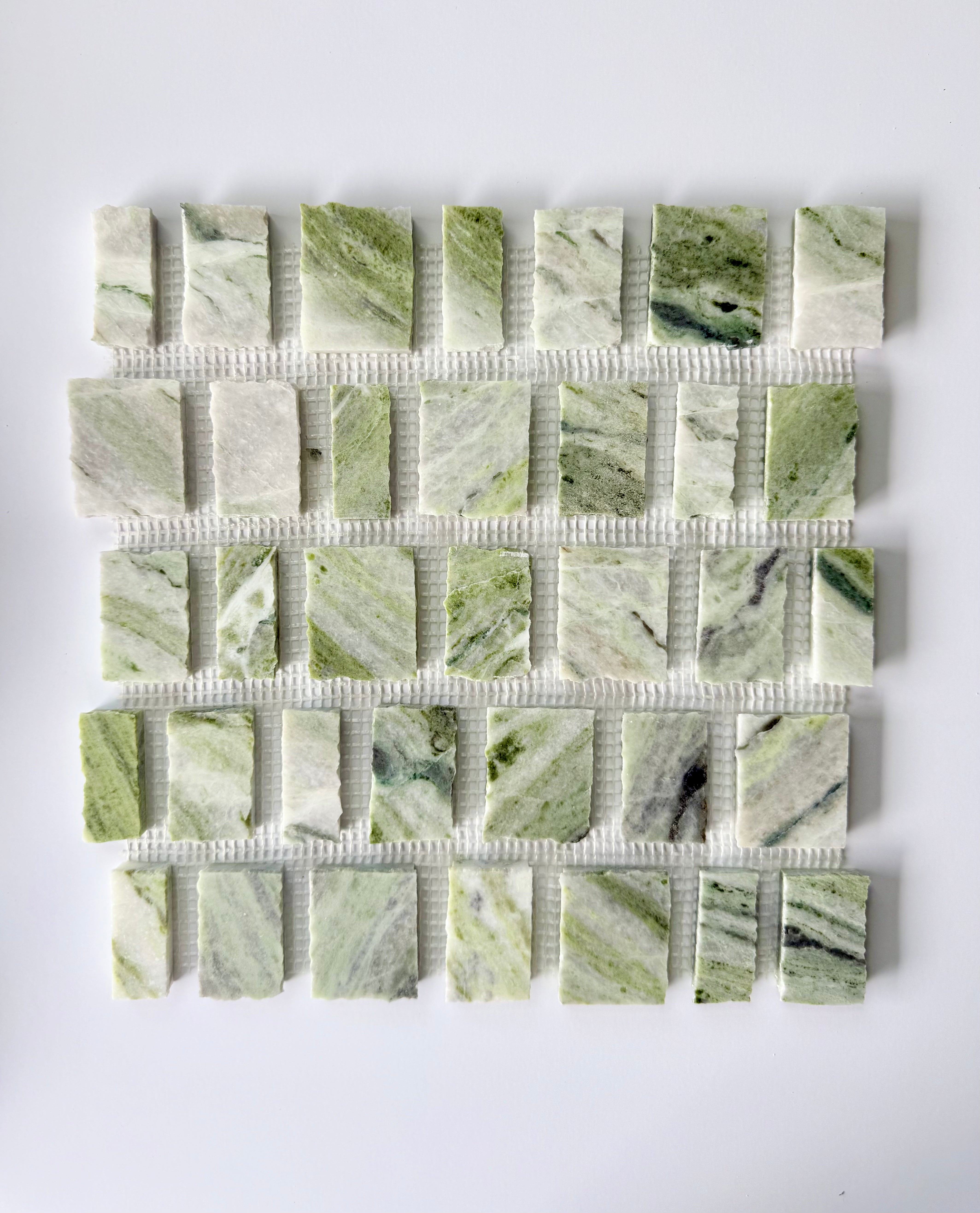 Scarpa I Green Vibes Rough Cut Mosaic by New York Cement Tile: green and white marble mesh tile in a grid pattern.