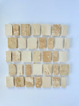 Scarpa I Golden Desert Mosaic Marble Mesh by New York Cement Tile, beige and cream tiles shown on a white background.