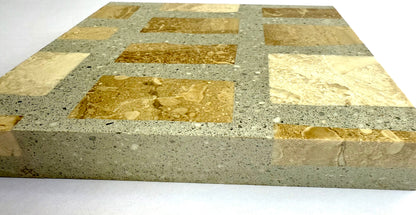 The Carlo Scarpa - Cappuccino Gray by New York Cement Tile features beige and brown stones in a gray concrete square tile.