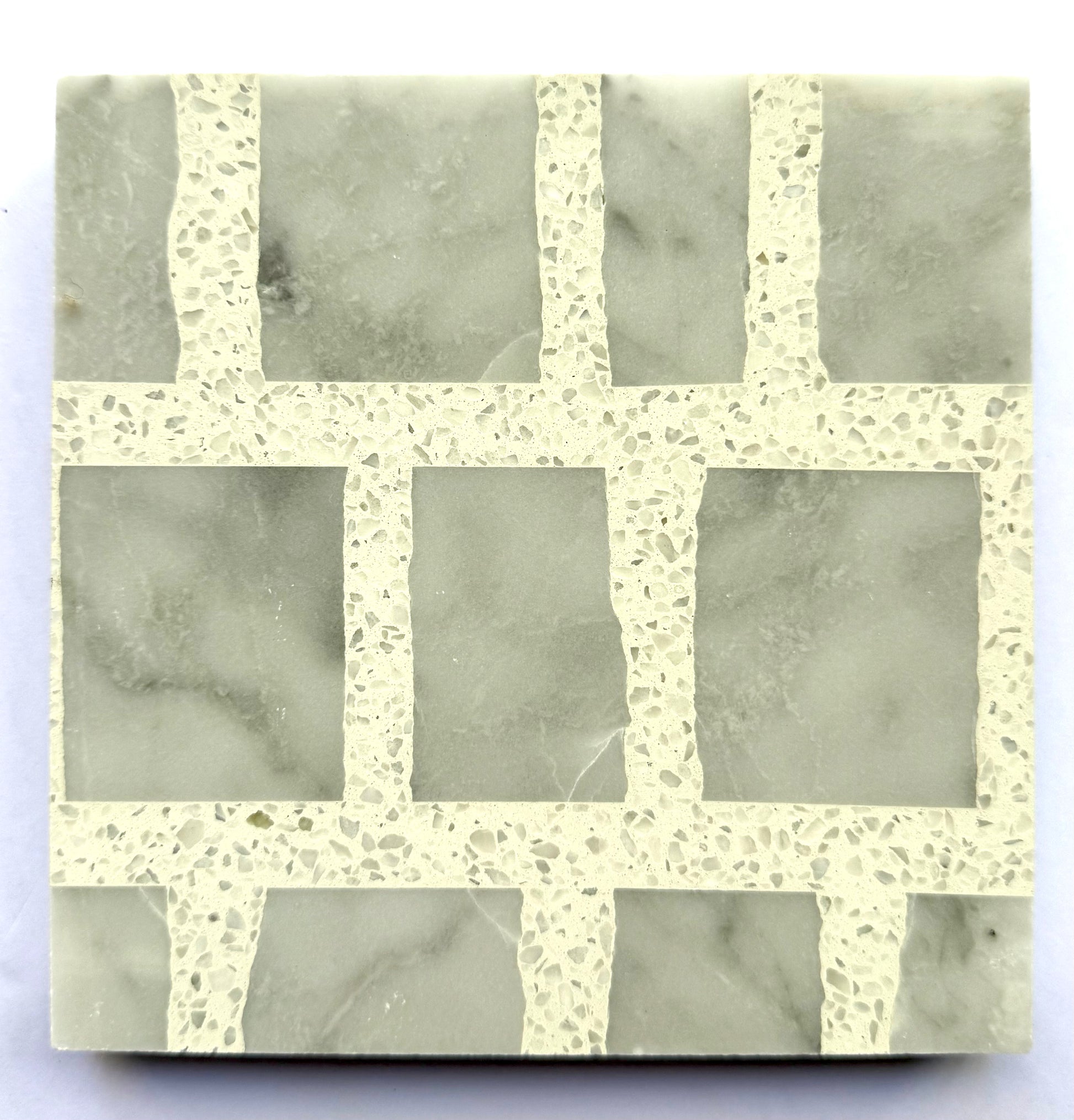 The Carlo Scarpa - Grey Dusk tile by New York Cement Tile features a gray and white grid with marble-like squares.