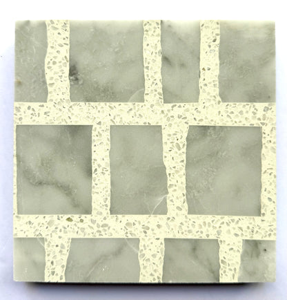 The Carlo Scarpa - Grey Dusk tile by New York Cement Tile features a gray and white grid with marble-like squares.