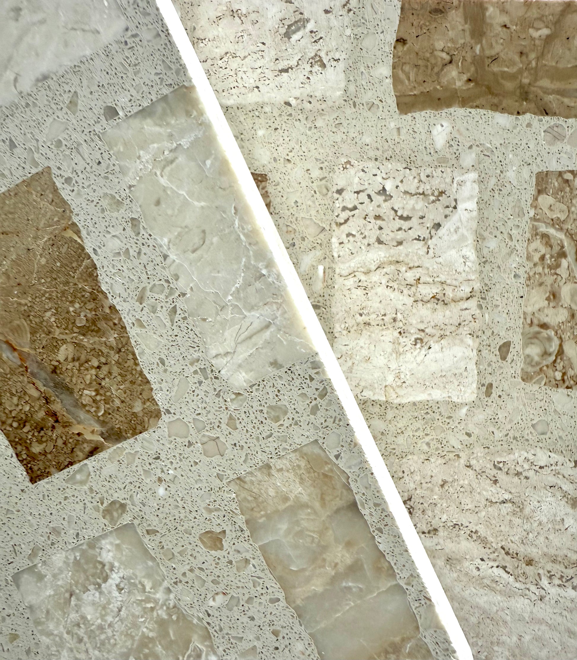 Close-up of Carlo Scarpa - Desert by New York Cement Tile: rectangular beige and brown tiles split by a white line.