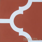N20-014 Extra Sample by New York Cement Tile: red tile with bold white geometric lines intersecting at the center.
