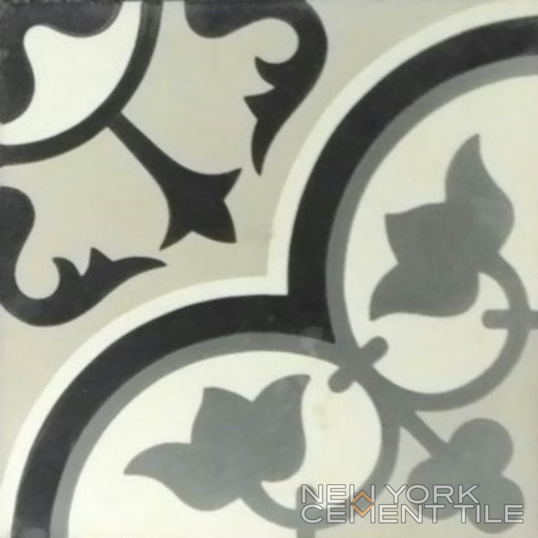 Gray and black cement tile (N20-045/172) with curved floral and vine patterns by New York Cement Tile.
