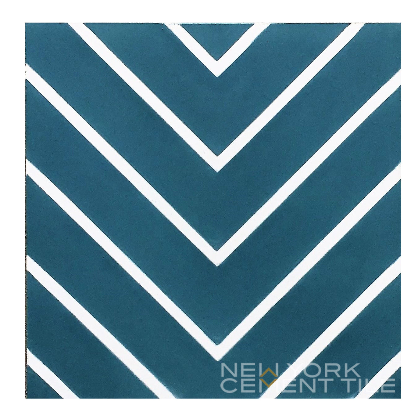 Blue tile, white chevron V-pattern; durable floor by New York Cement Tile, Product: N20-437, Sample.