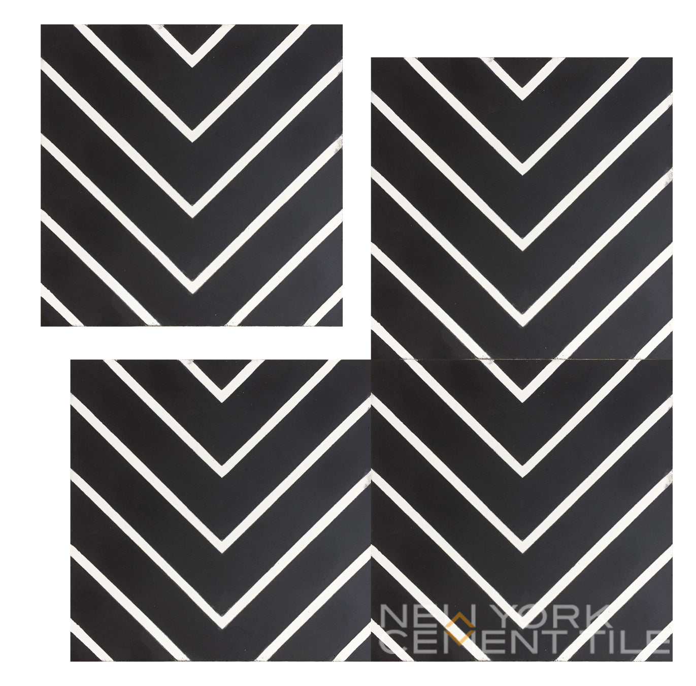 Four N20-437 black cement tiles by New York Cement Tile create a continuous white chevron V pattern.