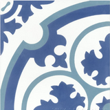 The N20-569 by New York Cement Tile features blue and white abstract circular floral and leaf patterns in symmetry.