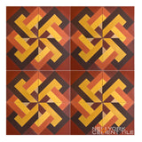 Interlocking yellow, orange & brown geometric tile (NL20-1B) from New York Cement Tile’s bold Geometrika collection.