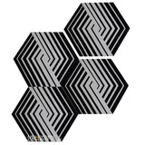 Three NL23-7 tiles by New York Cement Tile feature black and white geometric stripes, creating an optical illusion.