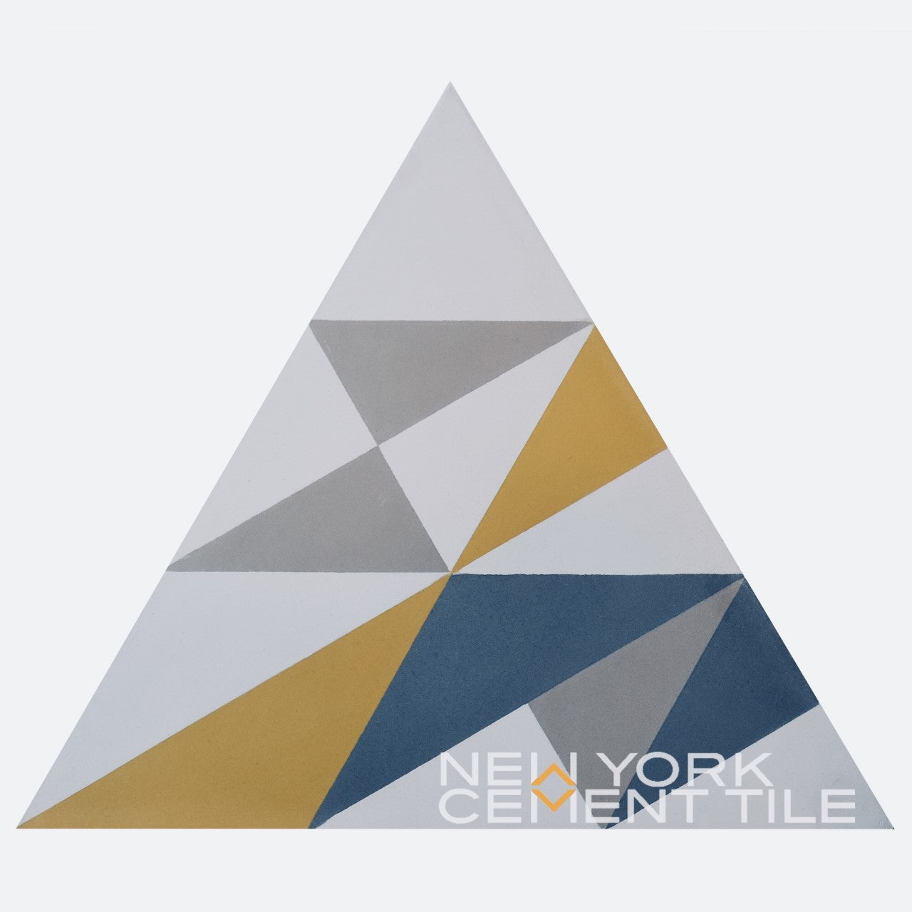 Triangle with gray, yellow, blue & white geometric shapes from our Geometrika line; NLT-12A, New York Cement Tile.