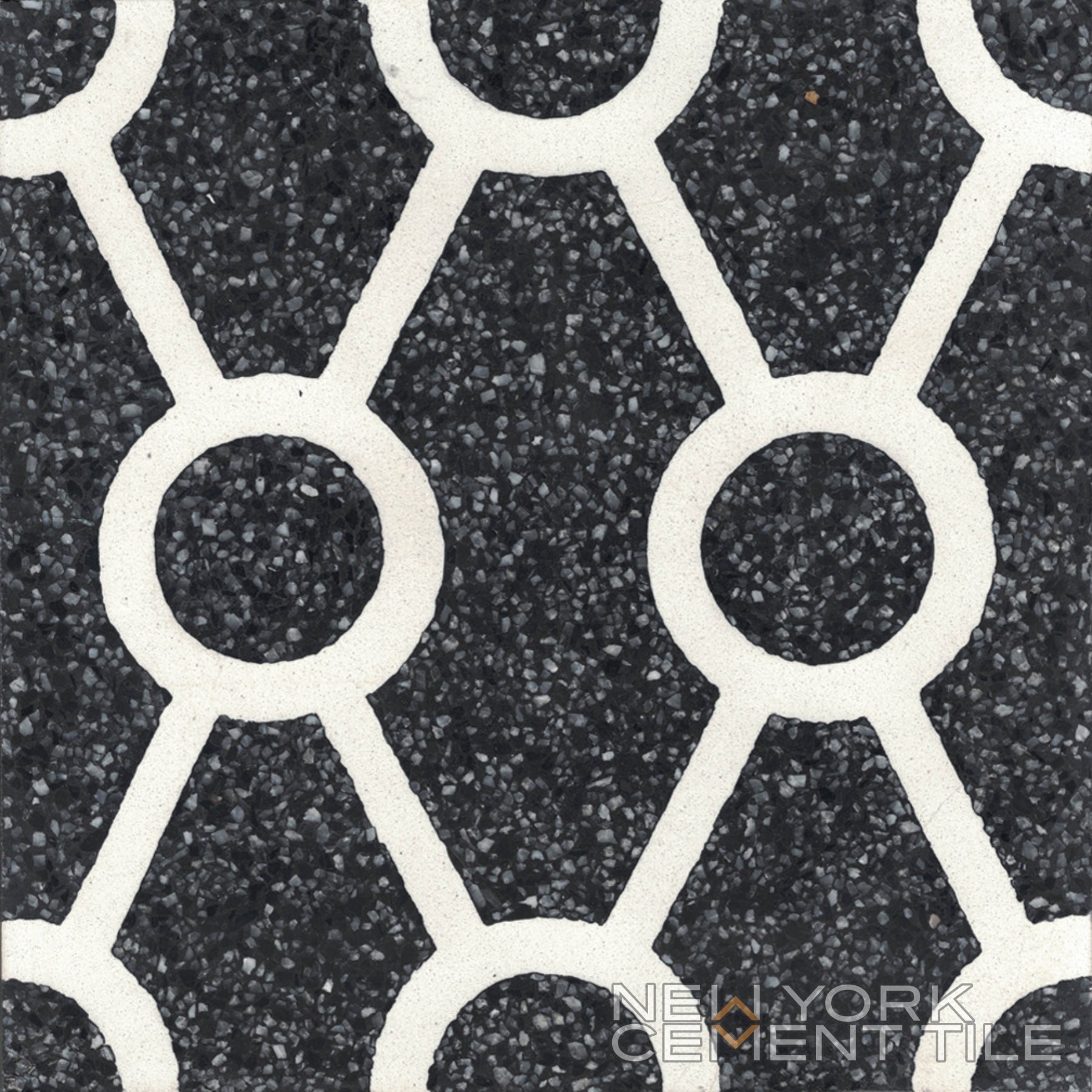 Terrazzo 8X8 - NT20-012 by New York Cement Tile: black mosaic tile with white geometric pattern and speckled texture.