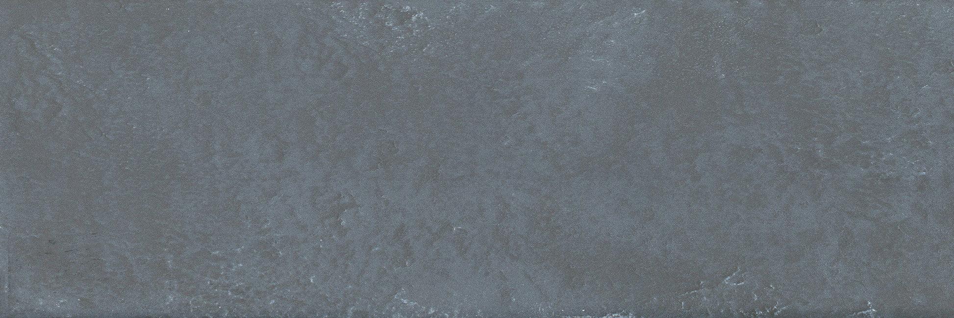 Contra Navy, Extra Sample by New York Cement Tile features a dark gray, tile-like texture with subtle pattern and shading variations.