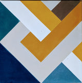 The NL20-1A tile by New York Cement Tile features varied colors and shapes from the Geometrika collection.