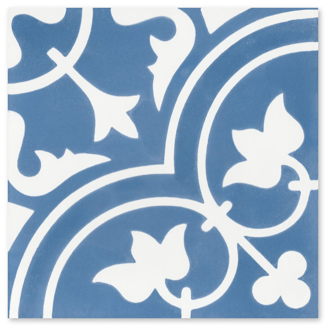 New York Cement Tile N20-045/172: blue and white tile with a symmetrical floral and vine pattern, bold curves, stylized leaves.