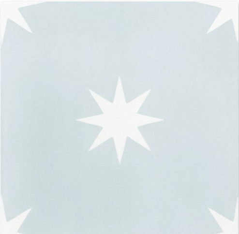 The Pleiades A In Powder Blue tile by New York Cement Tile features a white star design, ideal for durable flooring.