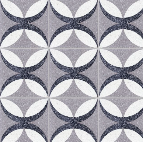 Petalos Pebble Terrazzo sample by New York Cement Tile features mosaic-inspired circles and leaf-like geometric patterns.