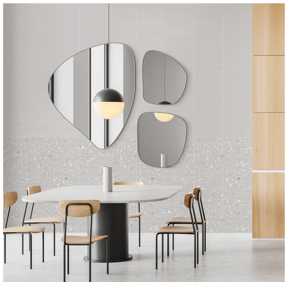 Modern dining area with white oval table, wooden chairs, and CORRAZZO-GRIS tiles by New York Cement Tile for style.