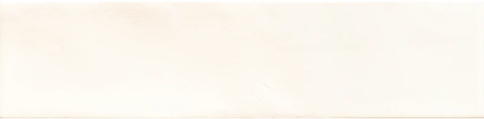 The HUSE 3X10 -WHITE tile by New York Cement Tile is a smooth, off-white rectangle with a subtle gloss and organic texture.
