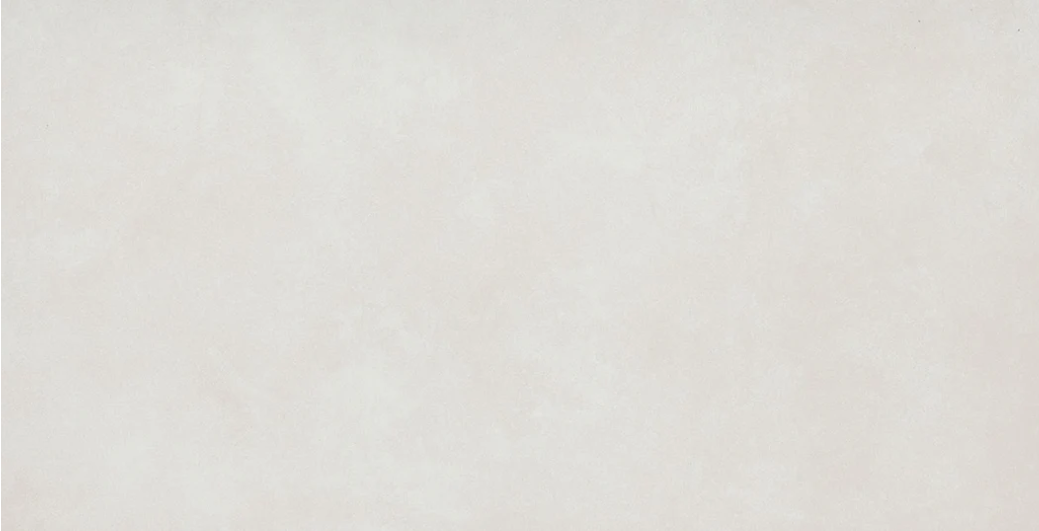 The AGIO-24X47 SLIM-BIANCO tile by New York Cement Tile features a pale, textured, marble-like surface.