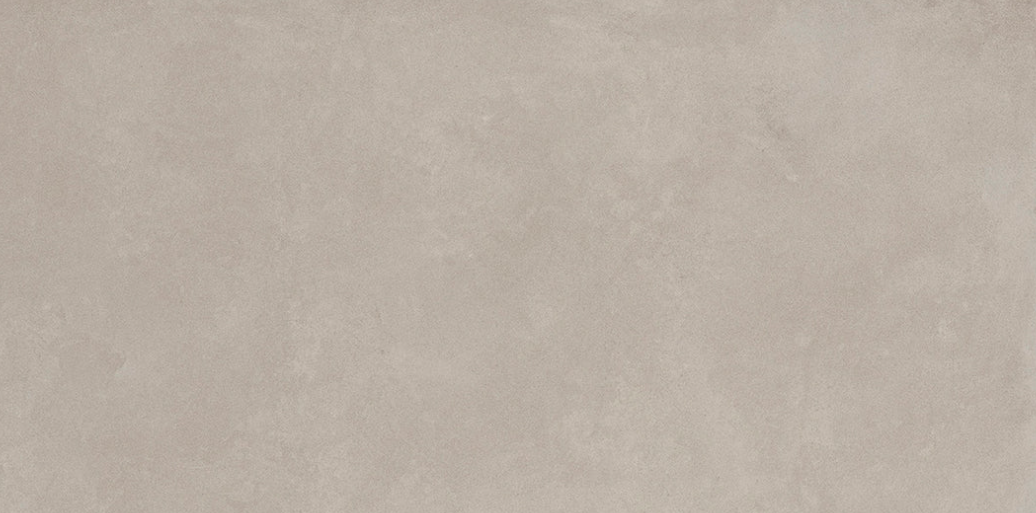 The AGIO 24" x 47" SLIM-Frassino by New York Cement Tile has a light beige, stone-like textured surface with subtle variations.