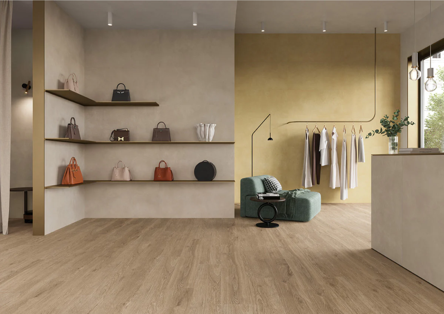 Minimalist boutique with AGIO 24"x47" SLIM-Senape tiles by New York Cement Tile, handbags, clothes, and a green chair.