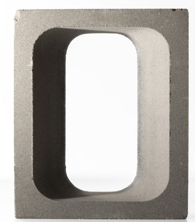 The GLAPA by New York Cement Tile is a gray rectangular concrete block with a large oval hollow center, viewed from the front.