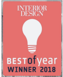 Coral badge with a white lightbulb, INTERIOR DESIGN Best of Year Winner 2018 written on it.