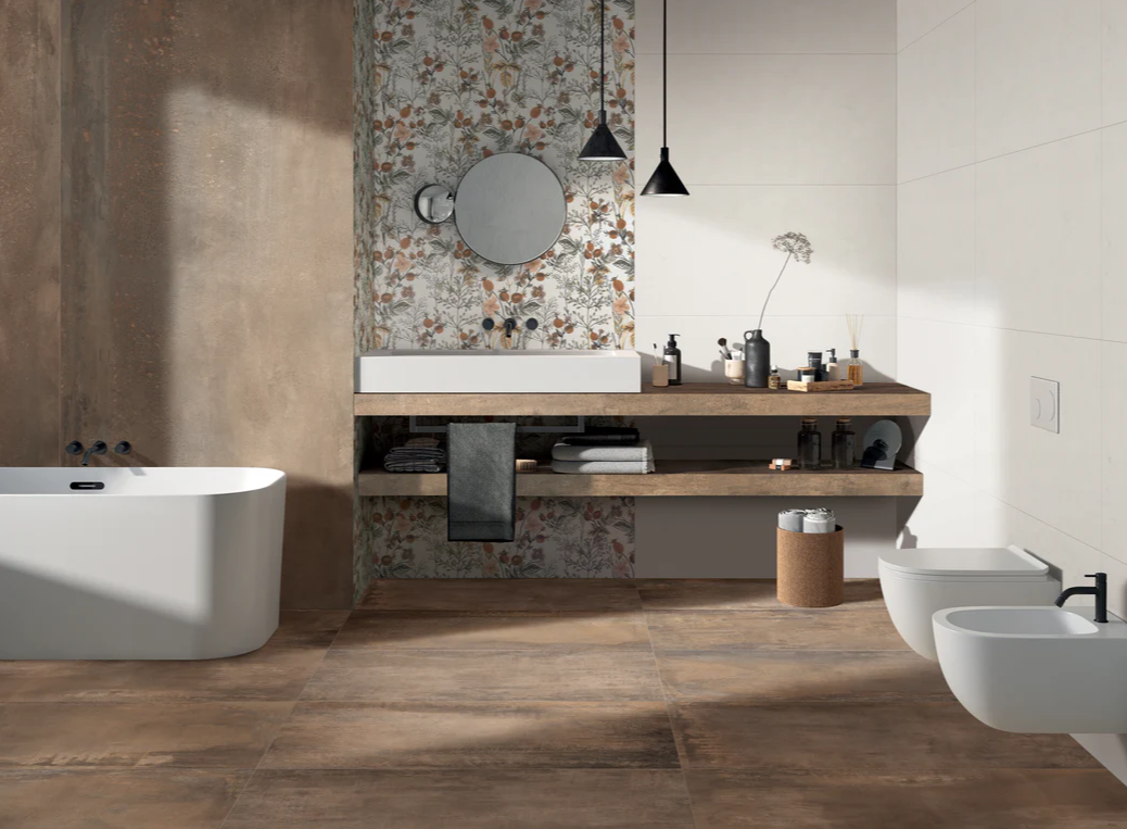 Modern bathroom with a freestanding tub, floral accent wall, floating sink, and minimalist decor in earthy tones.