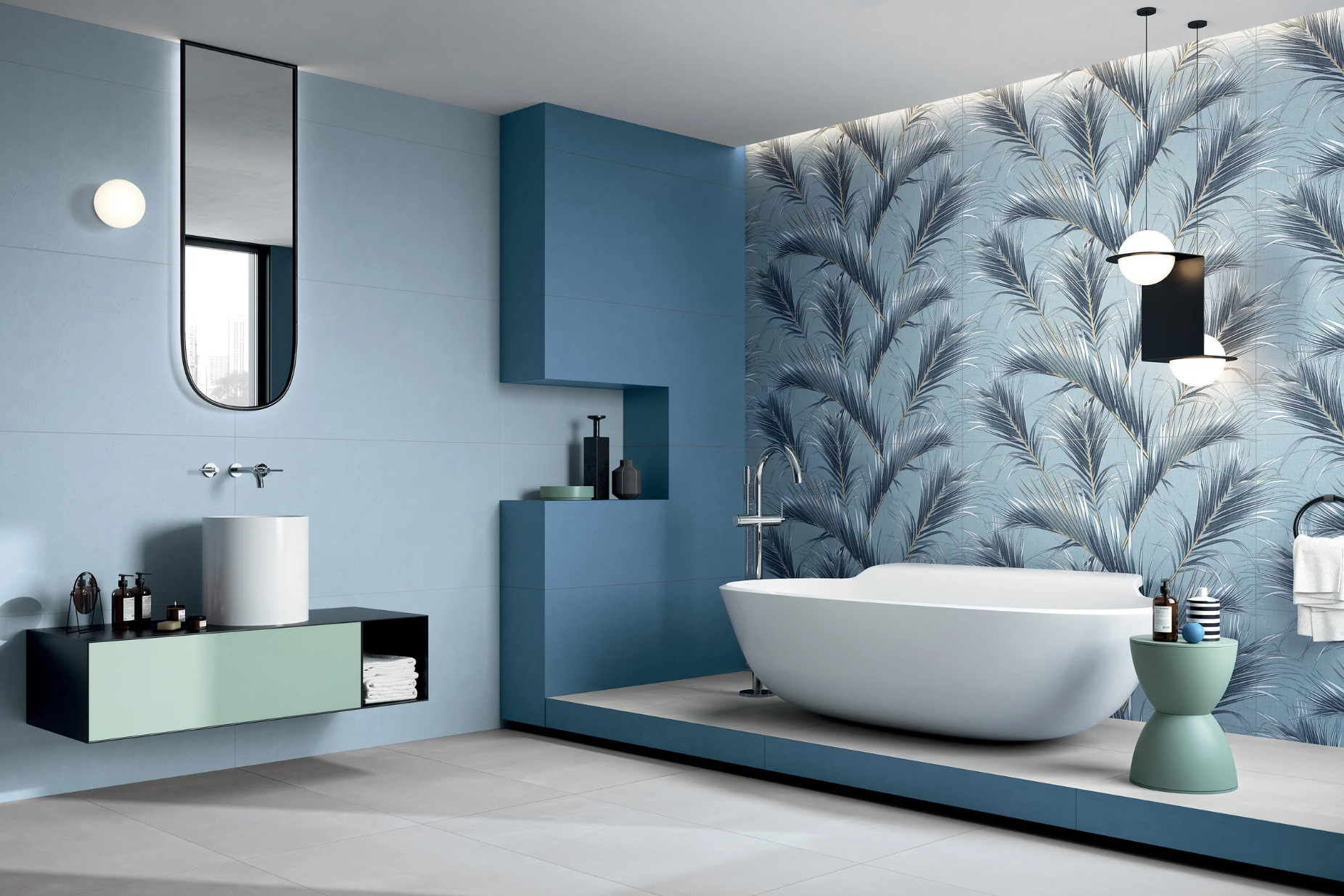 Modern bathroom with blue walls, palm leaf wallpaper, freestanding tub, floating sink, and stylish lighting.