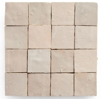 Sixteen Blushed Glazed 2X2 tiles by New York Cement Tile arranged in a neat 4x4 grid on a white background.
