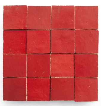 Sixteen Fiery Red tiles by New York Cement Tile in a 4x4 grid, shown from above.