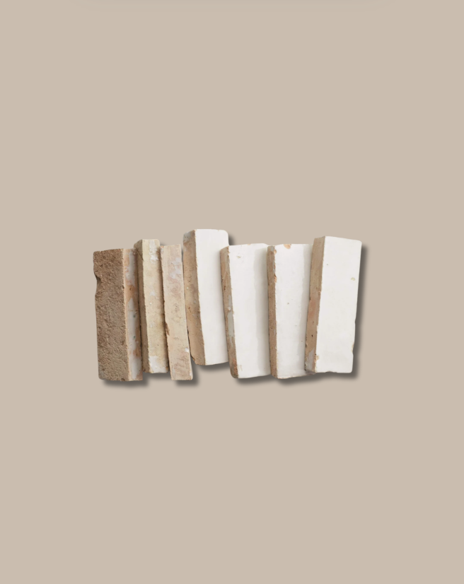 Sliced tofu and tempeh are arranged on New York Cement Tile's Ivory Cloud (2x6) in a neutral beige setting.