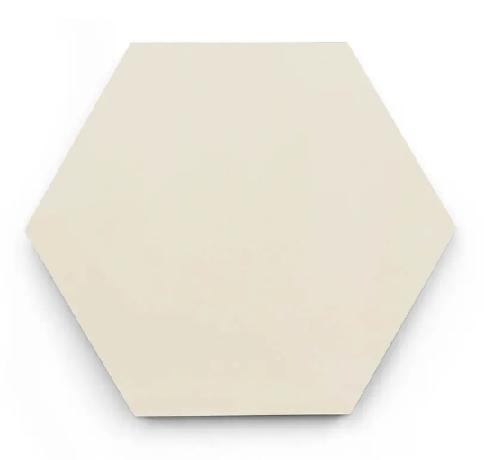 The Solid Hex- Sand tile by New York Cement Tile is a plain, beige handcrafted cement hexagon on a white background.