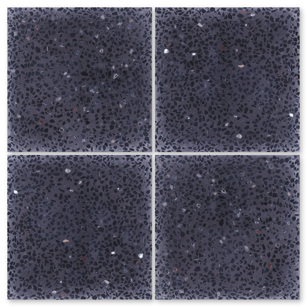 New York Cement Tile's Terrazzo 12X12 - NT30-Tribec sample features four durable dark gray tiles with subtle flecks in a 2x2 grid.