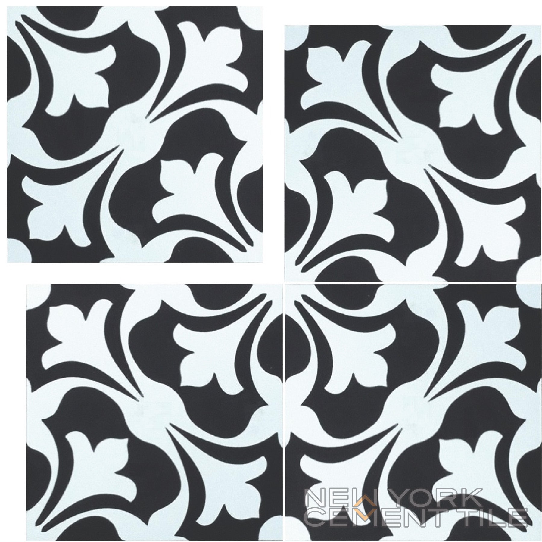 The N20-007 sample by New York Cement Tile features black and white handcrafted tiles in a symmetrical floral pattern.