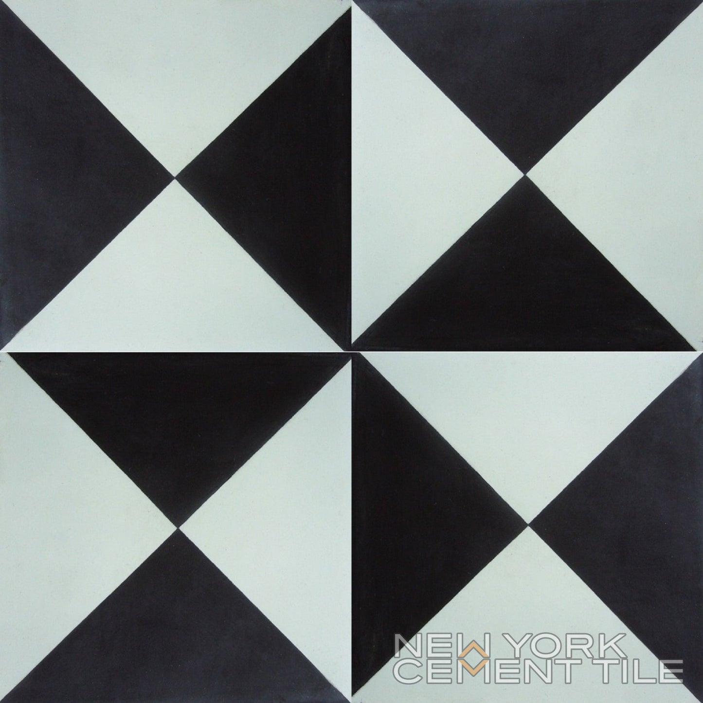 Geometric black & white handcrafted tile, triangular pinwheel pattern; N20-032 Extra Sample by New York Cement Tile.