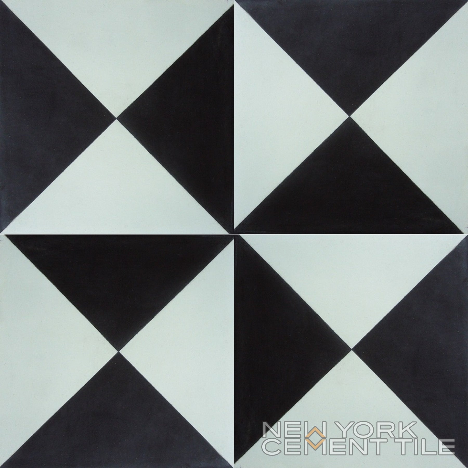 Geometric black & white handcrafted tile, triangular pinwheel pattern; N20-032 Extra Sample by New York Cement Tile.