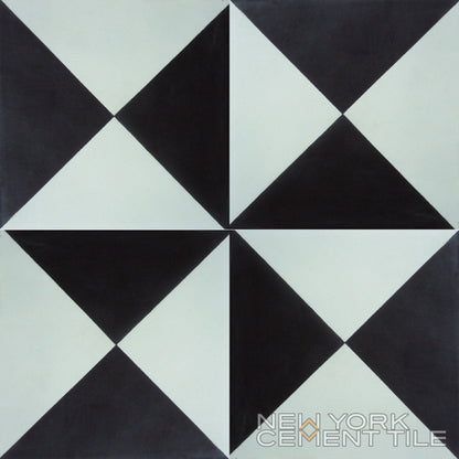 Geometric black, white, and gray triangle tile forms a pinwheel—N20-032 sample by New York Cement Tile.