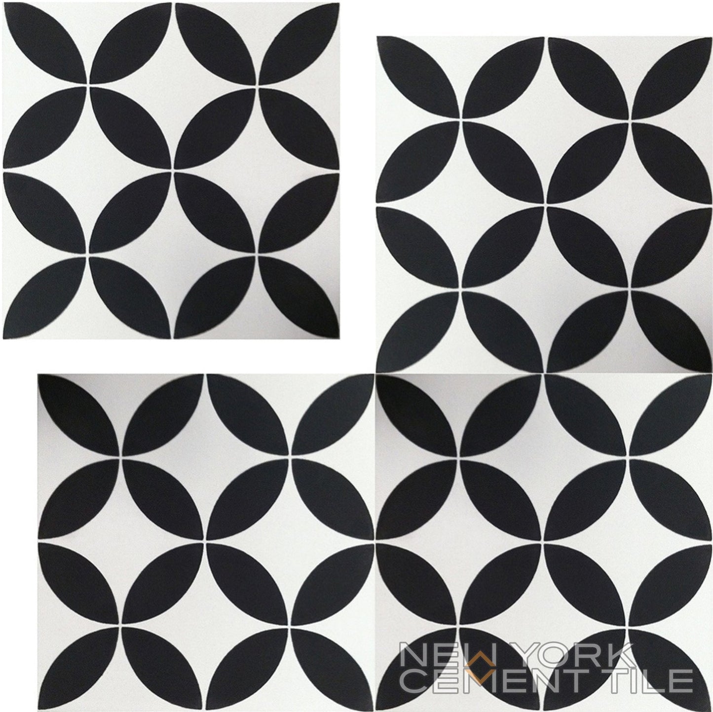 The N20-061 Extra Sample by New York Cement Tile features four black and white tiles with geometric floral petal patterns.