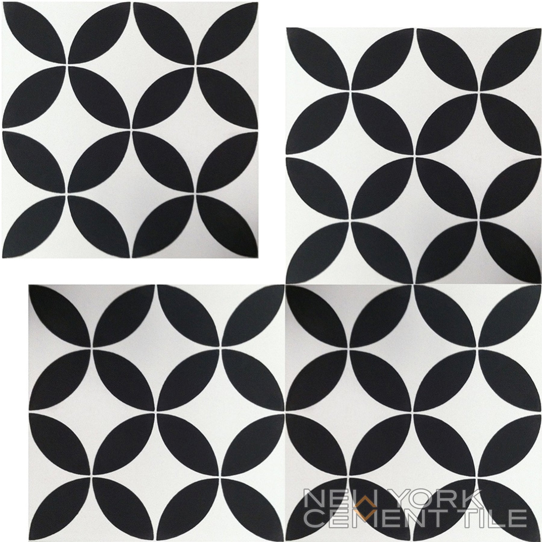 The N20-061 Extra Sample by New York Cement Tile features four black and white tiles with geometric floral petal patterns.