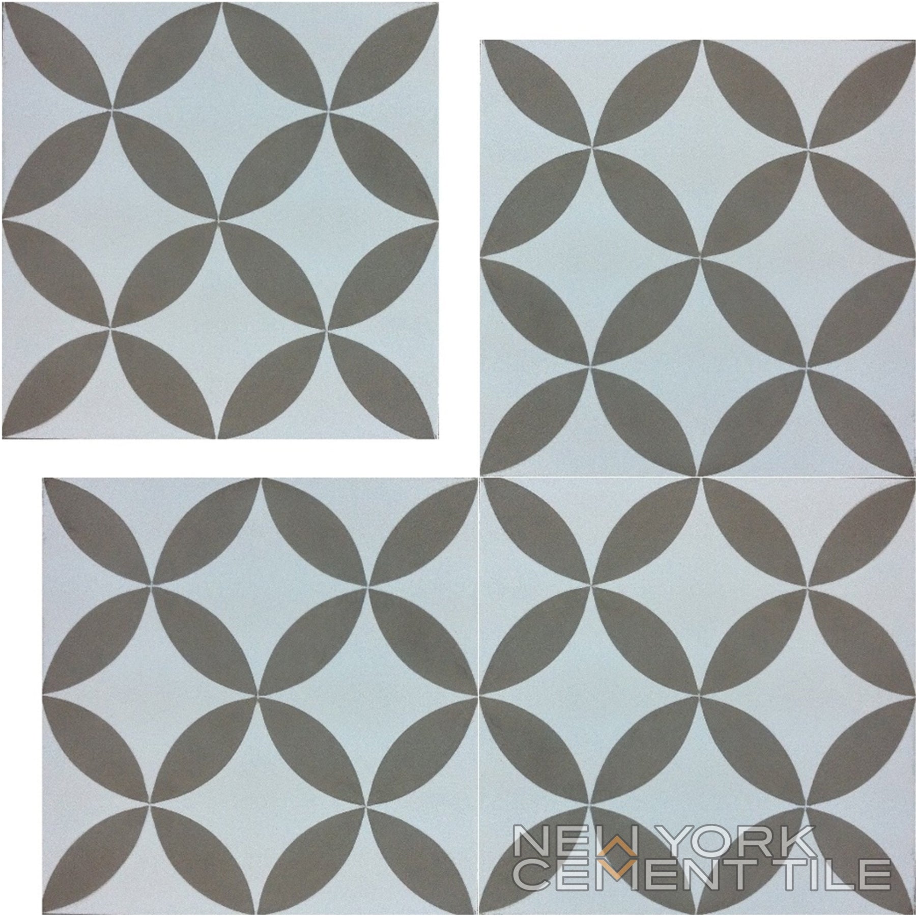 The New York Cement Tile N20-062 Extra Sample features 4 geometric, flower-like brown tiles on a white background.