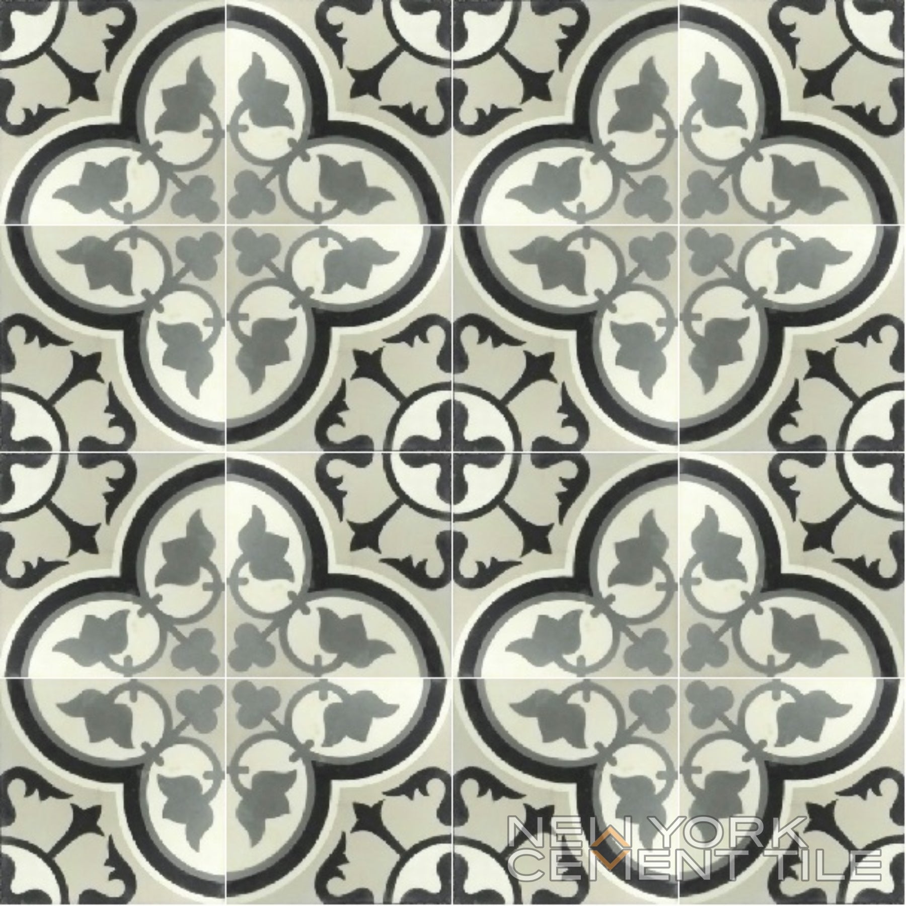 Handcrafted black and gray N20-172 tile by New York Cement Tile—durable, clover-like design for flooring.