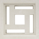 The Carabado Sample by New York Cement Tile is a white square breeze block with geometric cutouts for modern privacy screens.