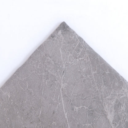 The Bardiglio by New York Cement Tile is a square gray marble tile with subtle white veining on a plain white background.